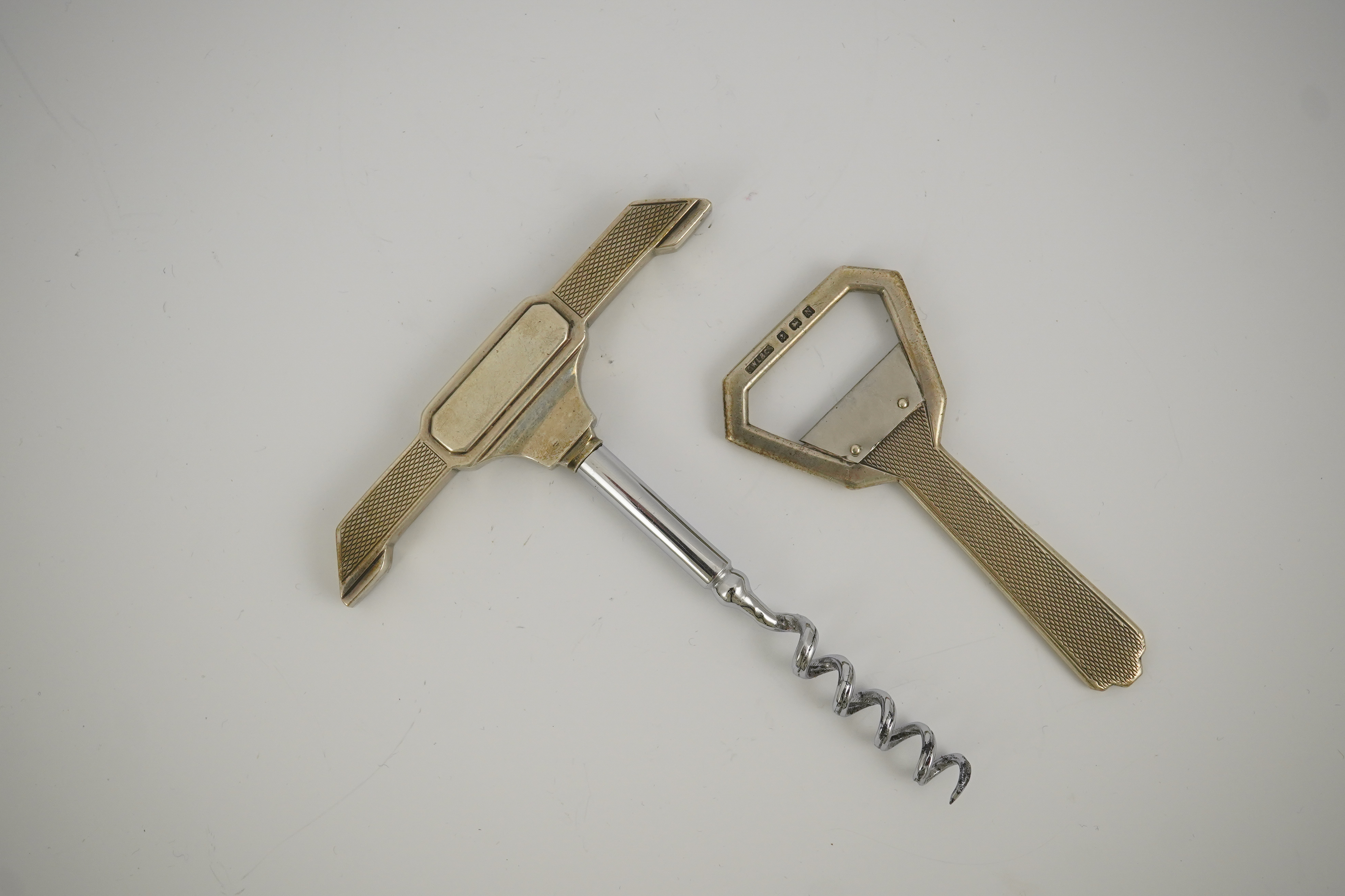 A cased 1930's Art Deco silver corkscrew and bottle opener set, by G.W. Lewis & Co